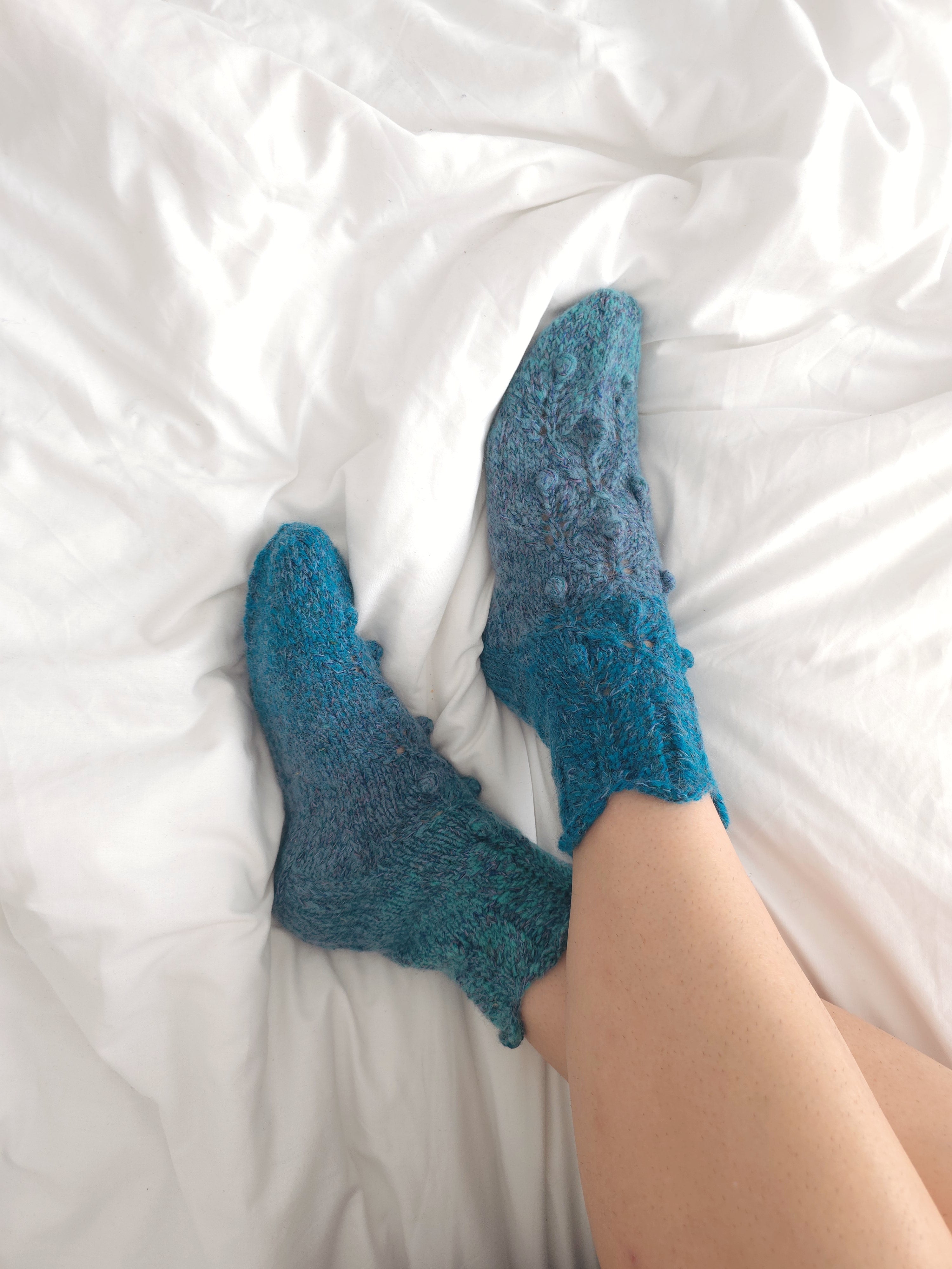 Light blue knitted socks from natural wool. Foot size 24cm