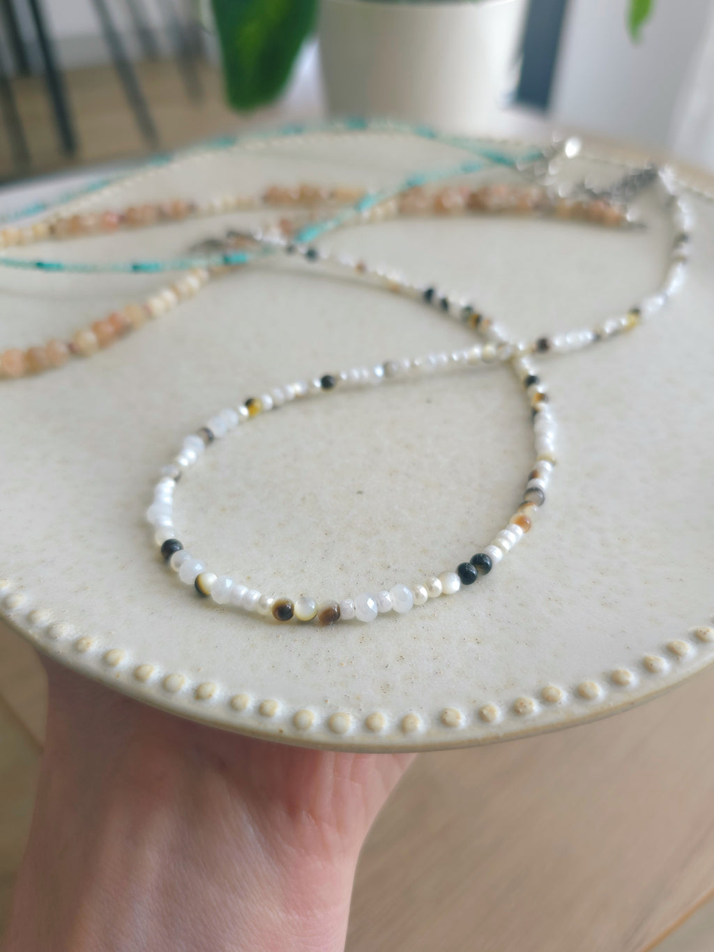 Beaded necklaces strands in various colors